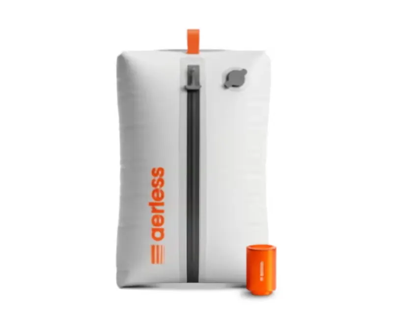 Single grey Aerless vacuum bag with orange zipper pull and the orange USB-C pump